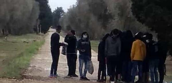 COVID19 in Italy, or making things as simple as possible /img/migrants-with-masks-in-puglia.jpg